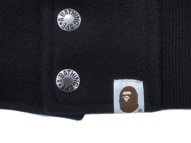 A BATHING APE×KAWS 'Chompers Varsity Jacket' Stadium Jacket Teeth Pattern Varsity Jacket Black KAWS BAPE A BATHING APE