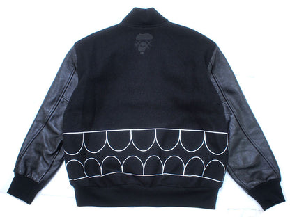 A BATHING APE×KAWS 'Chompers Varsity Jacket' Stadium Jacket Teeth Pattern Varsity Jacket Black KAWS BAPE A BATHING APE