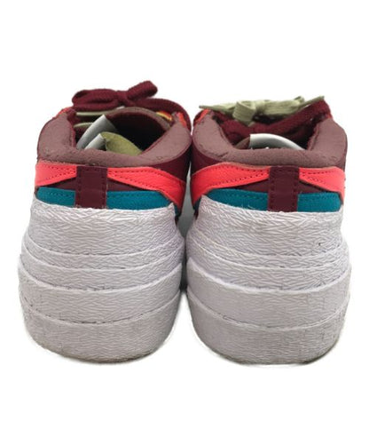 SACAI x KAWS" TEAM RED