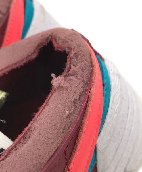 SACAI x KAWS" TEAM RED