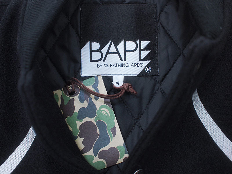 A BATHING APE×KAWS 'Chompers Varsity Jacket' Stadium Jacket Teeth Pattern Varsity Jacket Black KAWS BAPE A BATHING APE